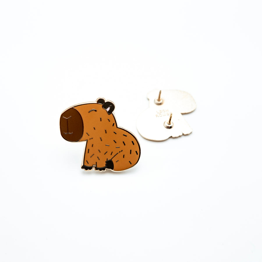 Side view of the cute capybara button.