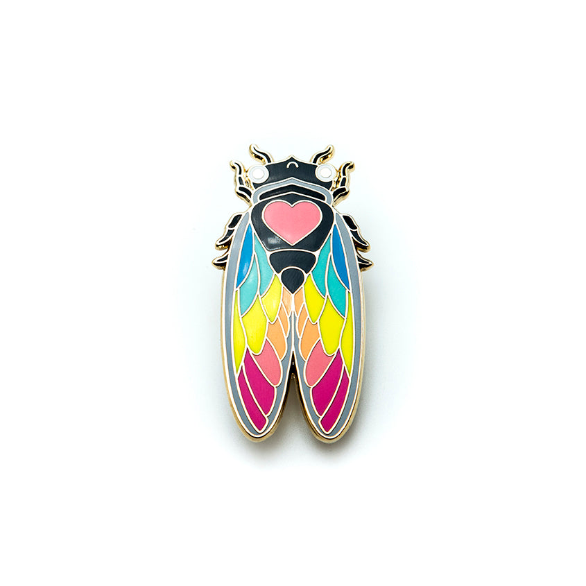 Detailed shot of the Colorful Bug Brooch, revealing the fine craftsmanship and butterfly clutch backing.