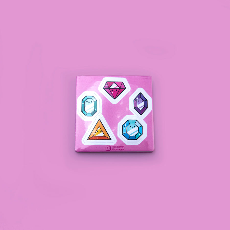 Cute and shiny gem-inspired hard enamel pins including Emerald, Ruby, Topaz, Citrine, and Amethyst.