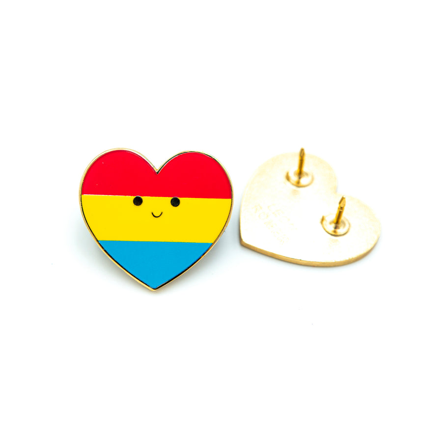 Close-up shot of the enamel pin showcasing the intricate design of the flag. The vibrant colors and fine details are visible, highlighting its significance as a symbol of attraction to all genders. pansexual cute pin
