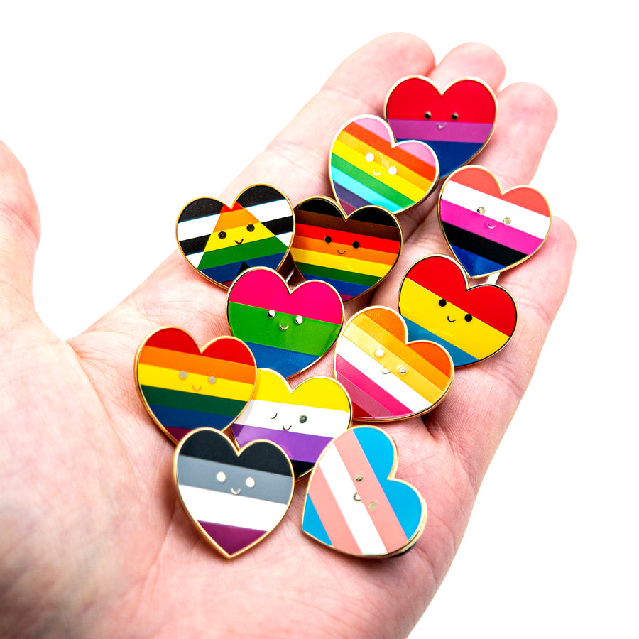 Enamel pin designed by Leon Römer featuring the original Rainbow Flag created by Gilbert Baker in 1978, representing the LGBTQ+ community's resilience and diversity.