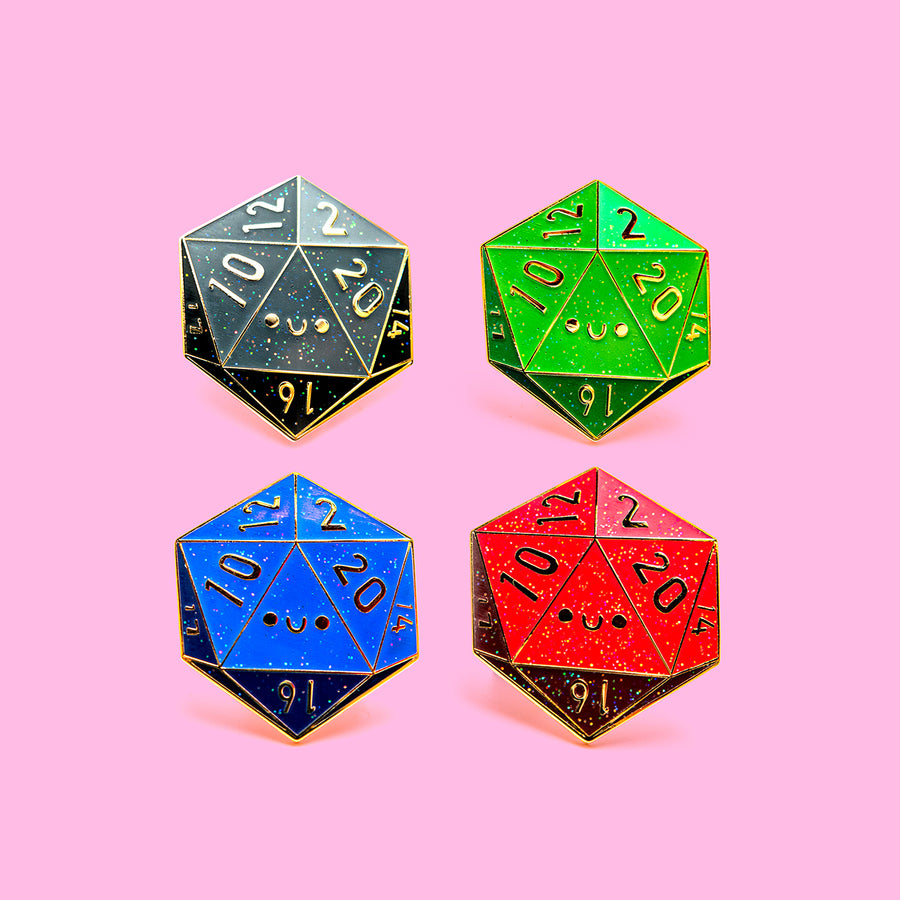 A gold-plated D20 enamel pin with glitter finish and vibrant colors