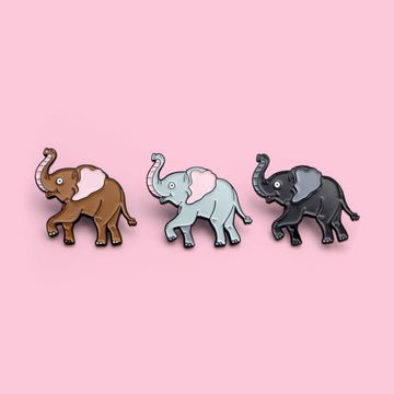 brown, gray and blach Elephant pins in a row