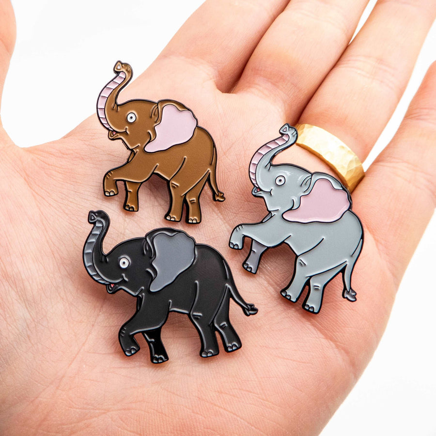 baby Elephant pins on a hand
