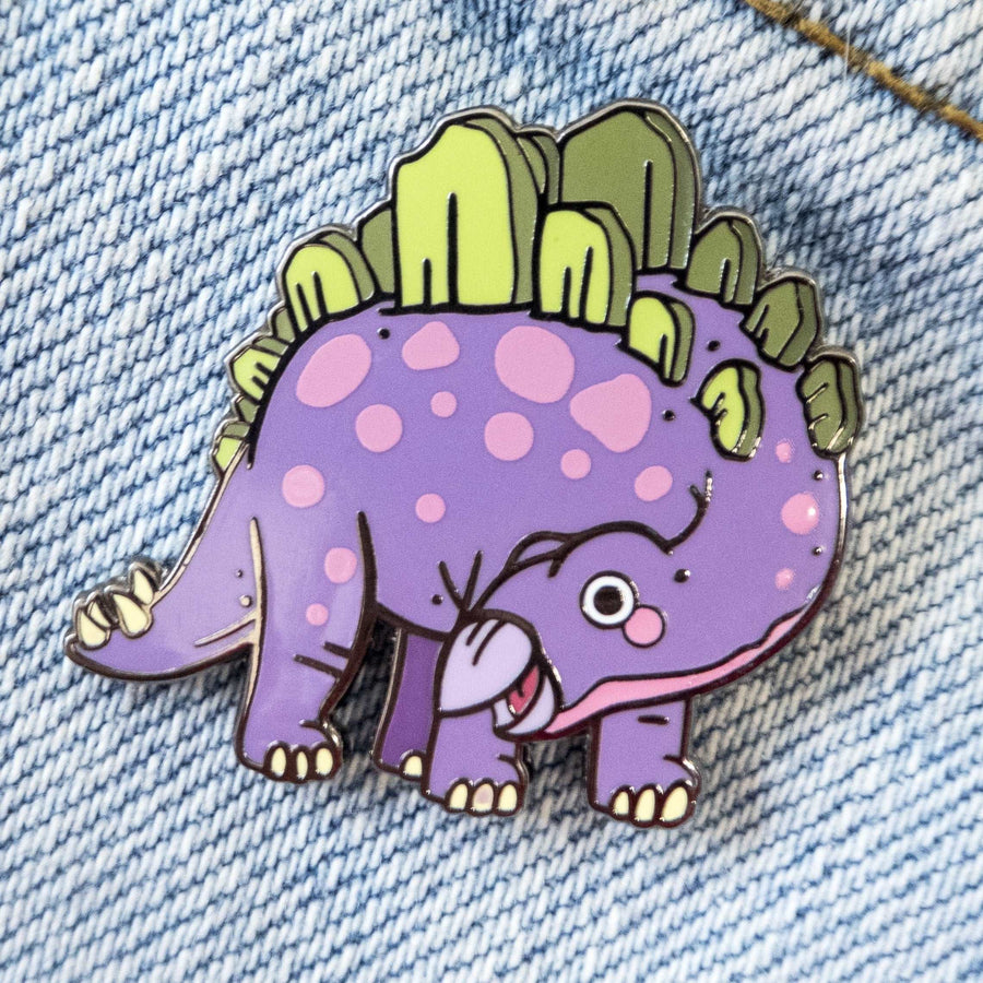 baby stegosaurus pin on light denim