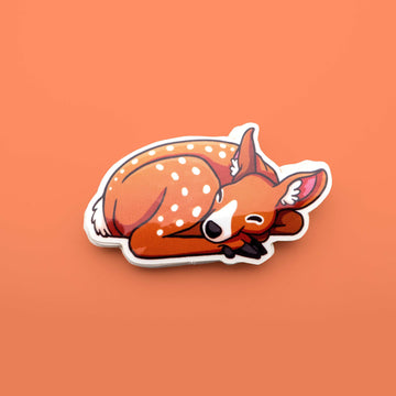 red baby deer taking a nap sticker