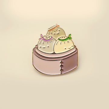 three kawaii dumplings in a basket soft enamel pin