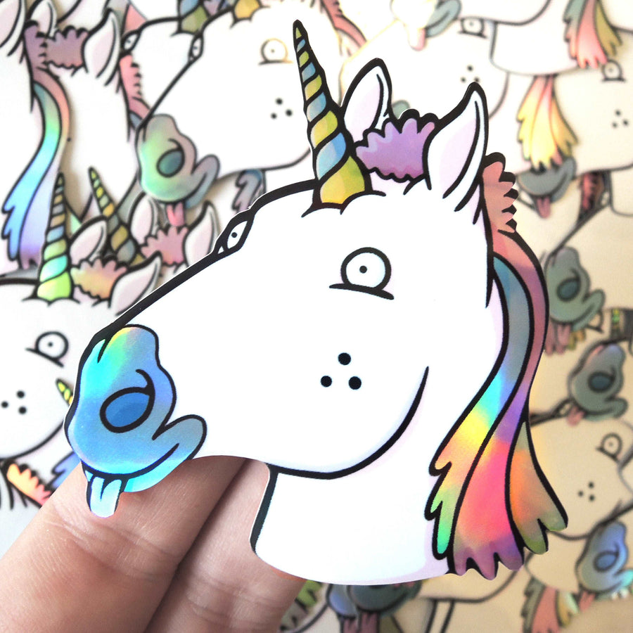 holographic unicorn vinyl die cut sticker with rainbow hair and his tongue out of his mouth