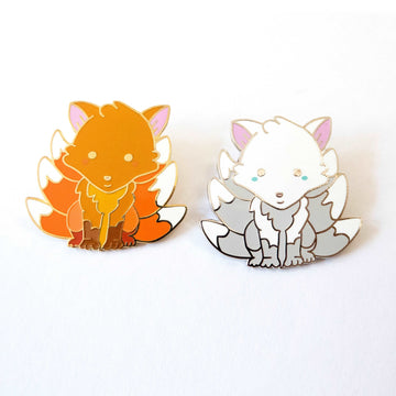 orange and white fox pins