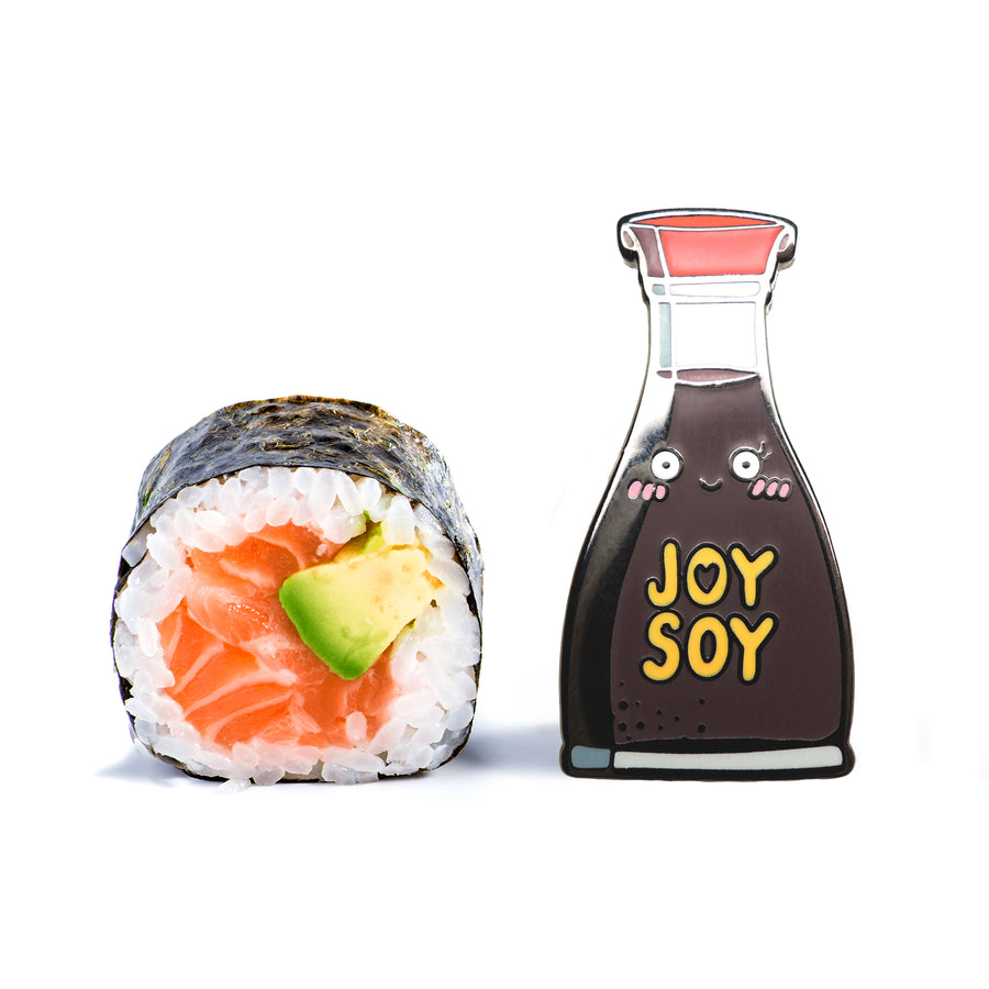 soy pin next to a sushi maki
