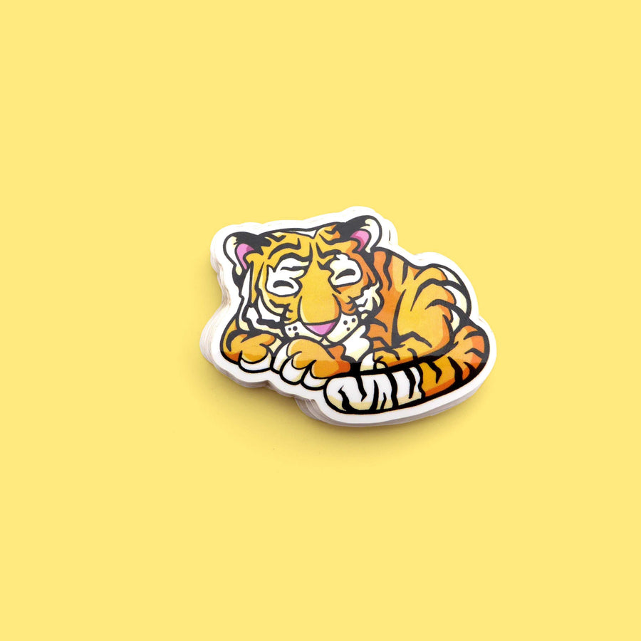 tiger taking a nap sticker