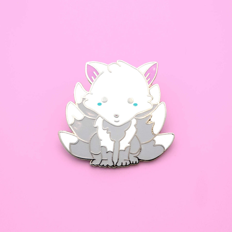 white fox lapel pin